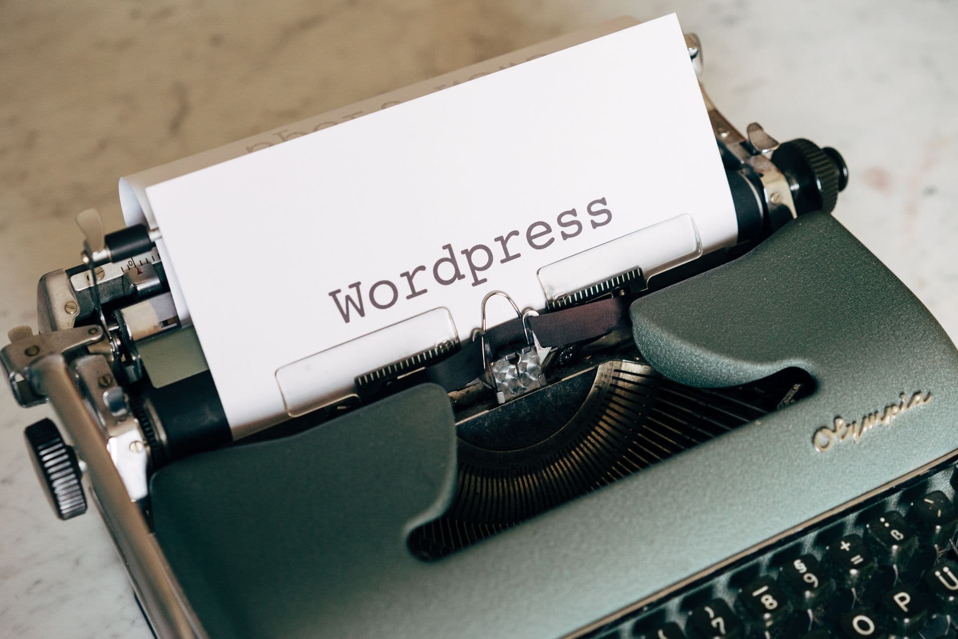 Vintage typewriter with the word WordPress typed on the page